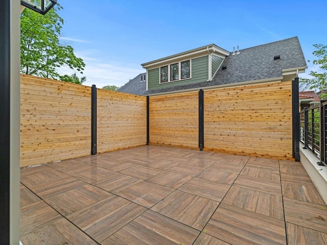 view of patio with fence
