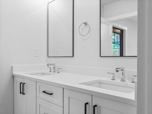 full bathroom featuring double vanity