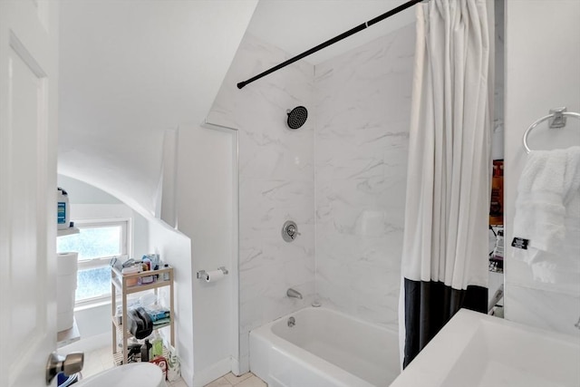 bathroom with shower / bath combination with curtain