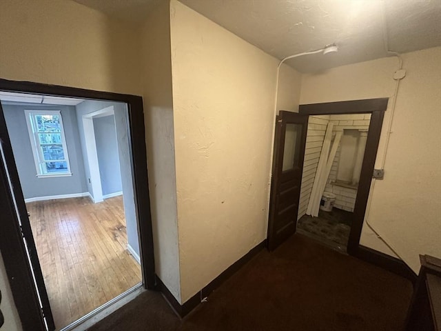 1025 Main St, Worcester, MA 01603 - hall featuring hardwood / wood-style floors and a textured wall