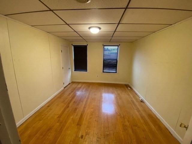 1025 Main St, Worcester, MA 01603 - empty room with a drop ceiling and light wood finished floors
