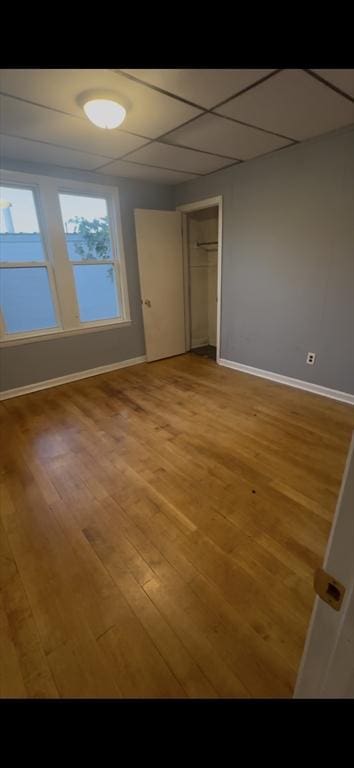 1025 Main St, Worcester, MA 01603 - unfurnished bedroom featuring light wood-type flooring and a closet