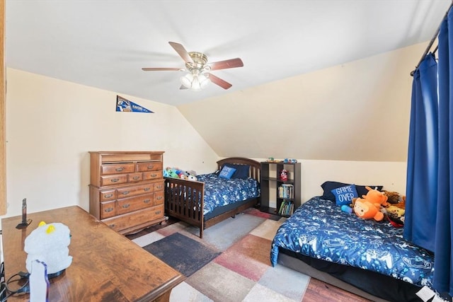 bedroom featuring ceiling fan and vaulted ceiling