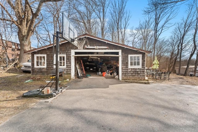 view of home's exterior featuring driveway