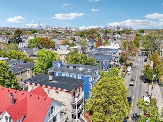 aerial view featuring a city view and a residential view