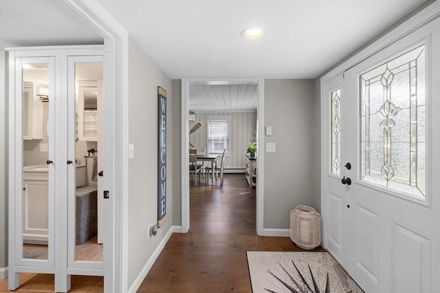 1091 Tobey St, New Bedford, MA 02745 - foyer featuring dark wood-style flooring and baseboards