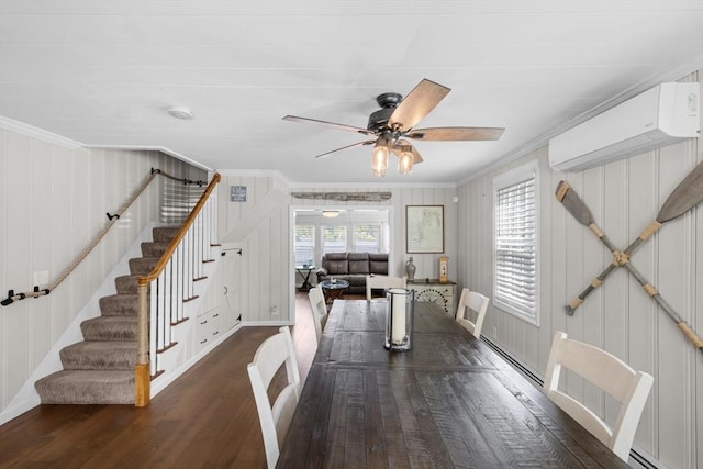 1091 Tobey St, New Bedford, MA 02745 - dining room with a wall mounted air conditioner, crown molding, wood finished floors, a ceiling fan, and stairway