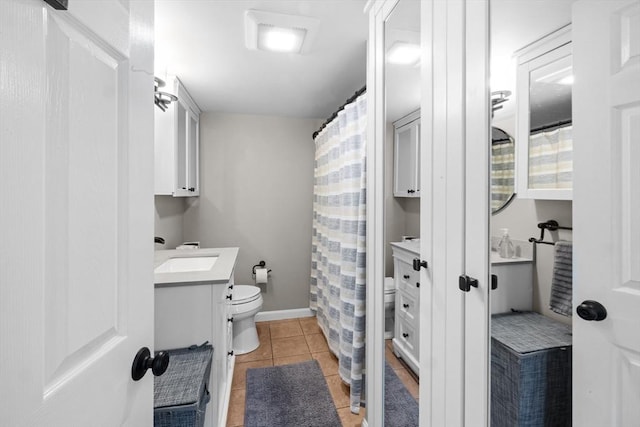1091 Tobey St, New Bedford, MA 02745 - bathroom with vanity, toilet, tile patterned floors, baseboards, and a shower with shower curtain