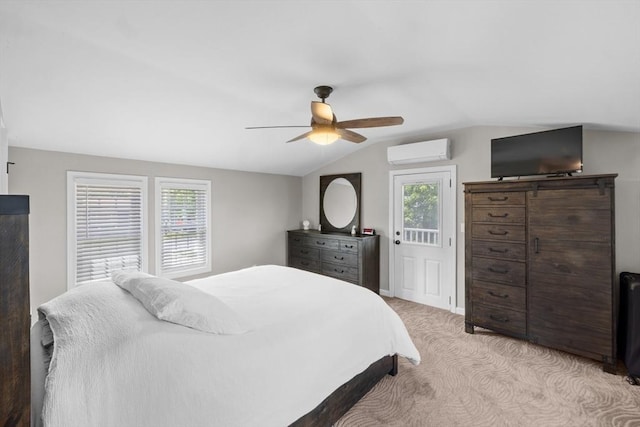 1091 Tobey St, New Bedford, MA 02745 - bedroom with a wall mounted AC, vaulted ceiling, light carpet, and ceiling fan
