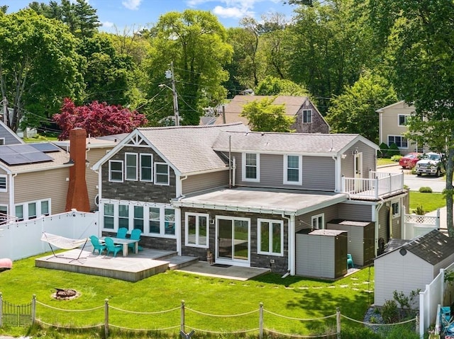 1091 Tobey St, New Bedford, MA 02745 - back of property featuring a patio area and stone siding