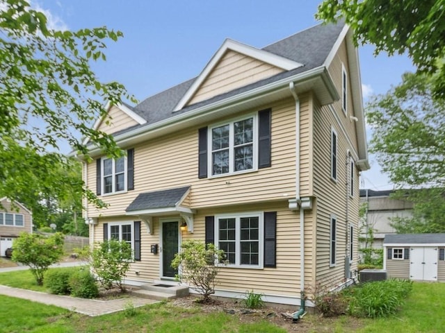 4 University Park, Waltham, MA 02453 - view of front of home featuring central AC unit and a front yard