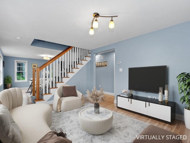 4 University Park, Waltham, MA 02453 - living room with wood finished floors, stairs, and baseboards
