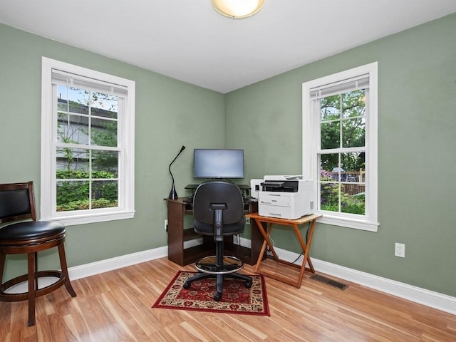 4 University Park, Waltham, MA 02453 - office area featuring healthy amount of natural light, wood finished floors, and baseboards