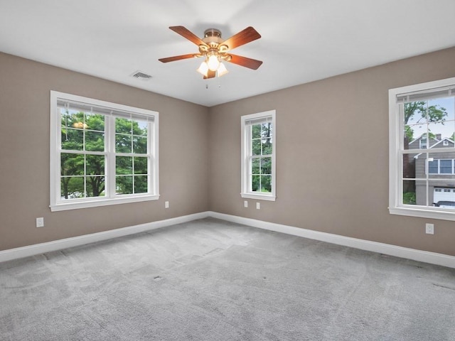 4 University Park, Waltham, MA 02453 - carpeted spare room with baseboards and ceiling fan