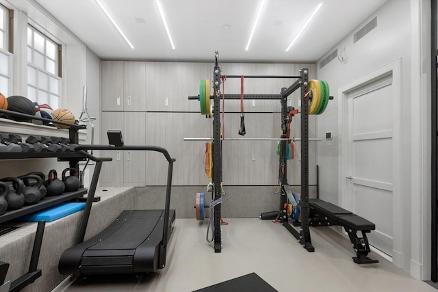 exercise room featuring visible vents