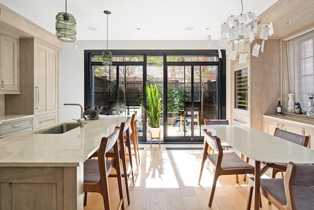 dining space with light wood-style flooring