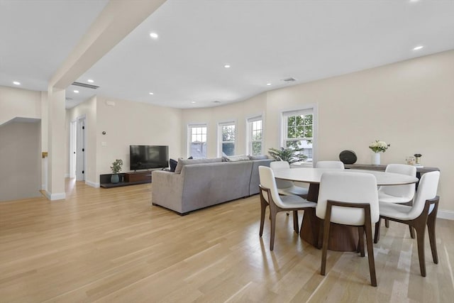 dining room with light wood-type flooring