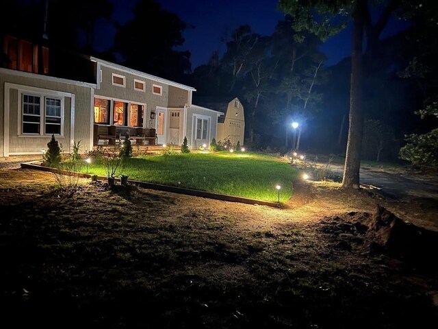 390 Brackett Rd, Eastham, MA 02642 - back of house at twilight with a yard