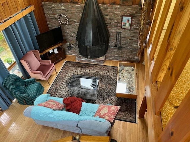390 Brackett Rd, Eastham, MA 02642 - sitting room featuring wood finished floors and brick wall