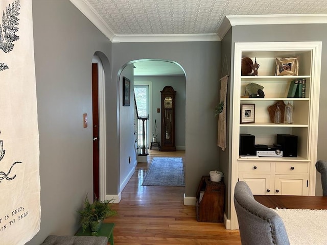 29 Deernolm St, Grafton, MA 01536 - hall featuring arched walkways, wood finished floors, baseboards, ornamental molding, and an ornate ceiling