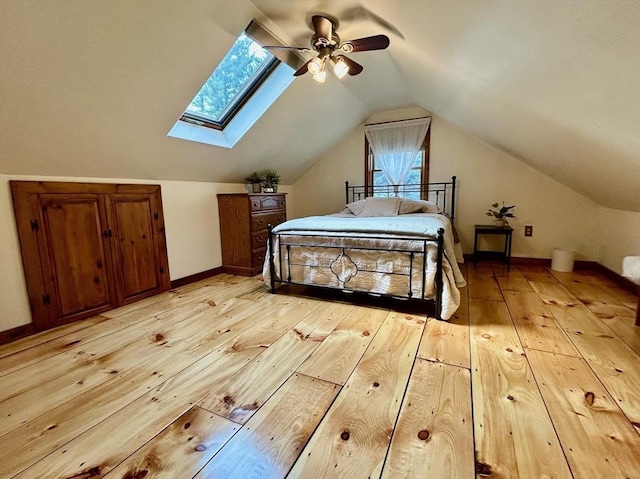 29 Deernolm St, Grafton, MA 01536 - bedroom with light wood-style floors, a skylight, and vaulted ceiling