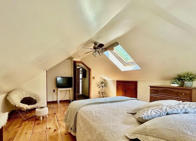29 Deernolm St, Grafton, MA 01536 - bedroom featuring a skylight, light wood-style floors, vaulted ceiling, a ceiling fan, and baseboards