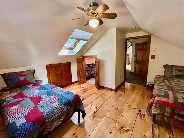29 Deernolm St, Grafton, MA 01536 - bedroom with a skylight, light wood-style flooring, lofted ceiling, and a ceiling fan