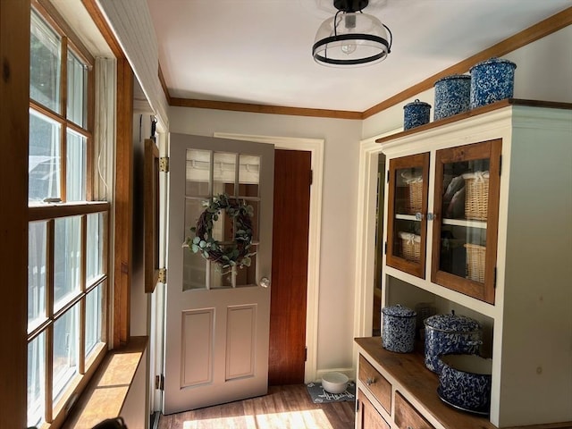 29 Deernolm St, Grafton, MA 01536 - doorway to outside with light wood-type flooring and baseboards