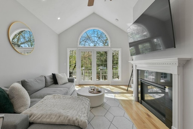 410 Salem St Unit 707, Wakefield, MA 01880 - living room featuring a ceiling fan, wood finished floors, a glass covered fireplace, recessed lighting, and high vaulted ceiling