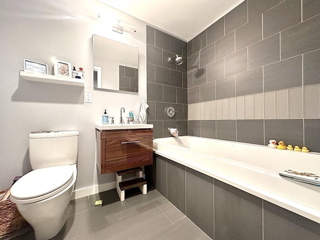 full bathroom featuring tile patterned flooring, vanity, toilet, and independent shower and bath