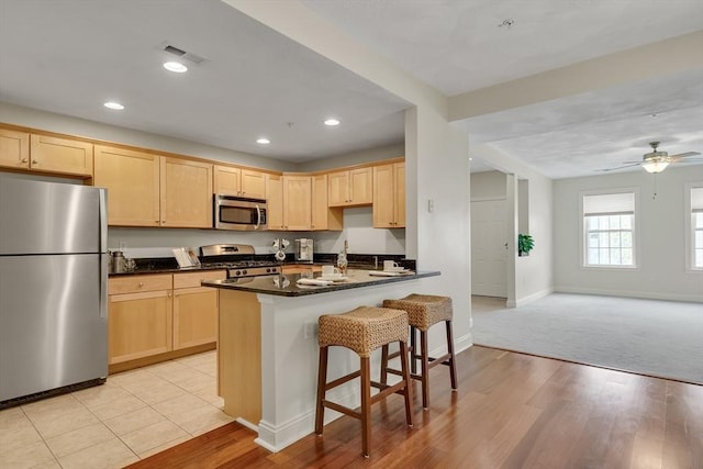 82 Virginia Rd Unit 405, Lincoln, MA 01773 - kitchen with stainless steel appliances, light brown cabinetry, baseboards, and recessed lighting