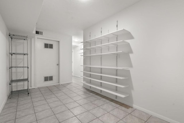 44 Fresh Pond Pl Unit 44, Cambridge, MA 02138 - spare room with baseboards and light tile patterned floors