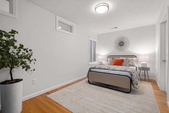 44 Fresh Pond Pl Unit 44, Cambridge, MA 02138 - bedroom with wood finished floors and baseboards