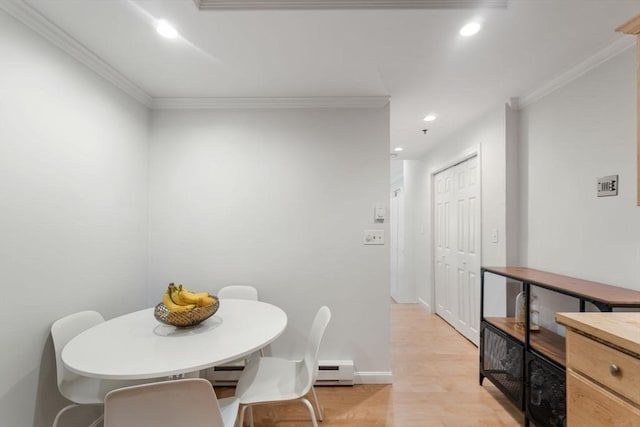 10 Beacon St Unit 105, Woburn, MA 01801 - dining space with crown molding, light wood-style flooring, recessed lighting, baseboards, and a baseboard radiator