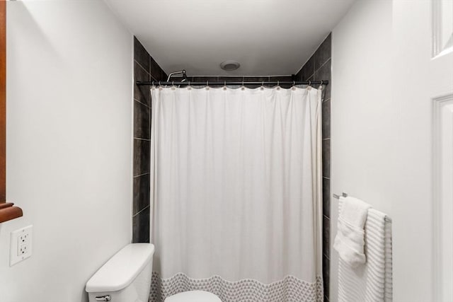 10 Beacon St Unit 105, Woburn, MA 01801 - bathroom with toilet and a shower with curtain