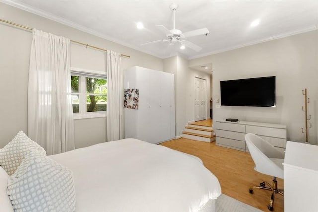 10 Beacon St Unit 105, Woburn, MA 01801 - bedroom with light wood-style floors, recessed lighting, crown molding, and a ceiling fan