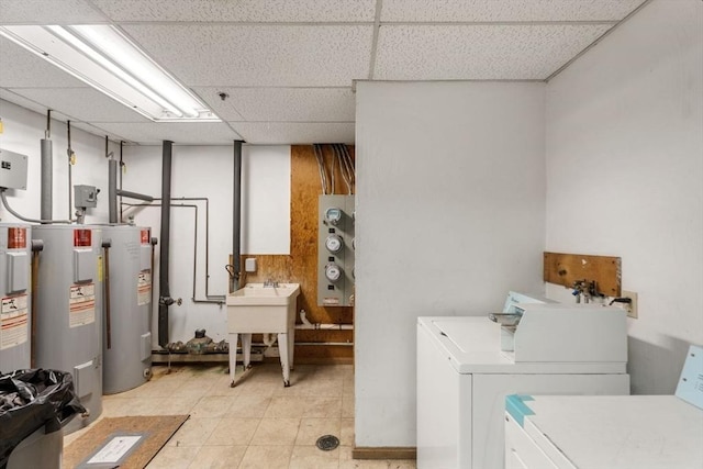 10 Beacon St Unit 105, Woburn, MA 01801 - washroom featuring water heater and independent washer and dryer