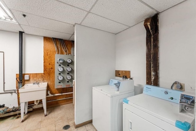 10 Beacon St Unit 105, Woburn, MA 01801 - laundry area featuring washing machine and dryer and a sink