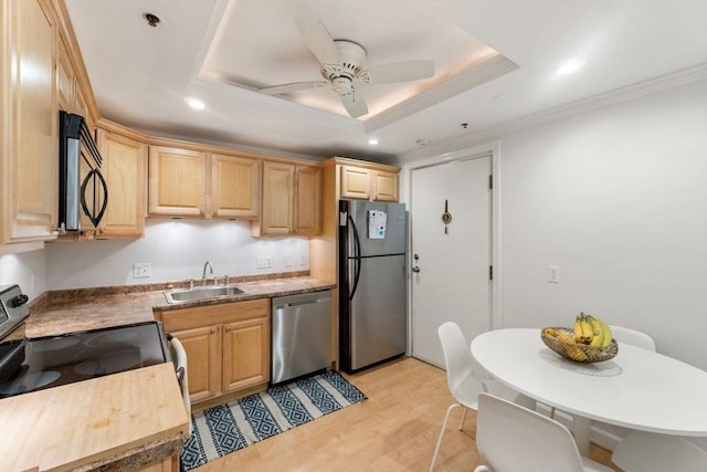 10 Beacon St Unit 105, Woburn, MA 01801 - kitchen featuring appliances with stainless steel finishes, a sink, light brown cabinets, light wood-style flooring, and crown molding