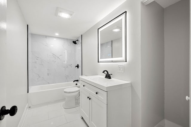 full bathroom featuring vanity, tiled shower / bath combo, toilet, and tile patterned flooring