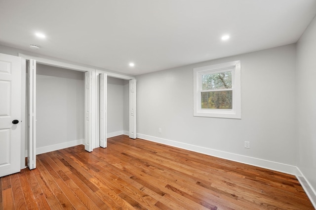 basement with wood-type flooring