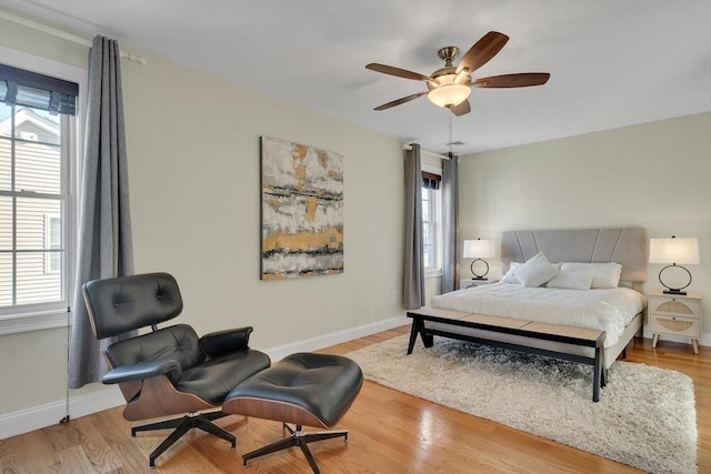 bedroom featuring ceiling fan and light wood-type flooring