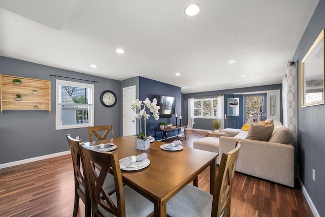 dining area with baseboards, recessed lighting, and wood finished floors