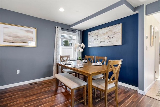 dining area with baseboards, recessed lighting, wood finished floors, and visible vents