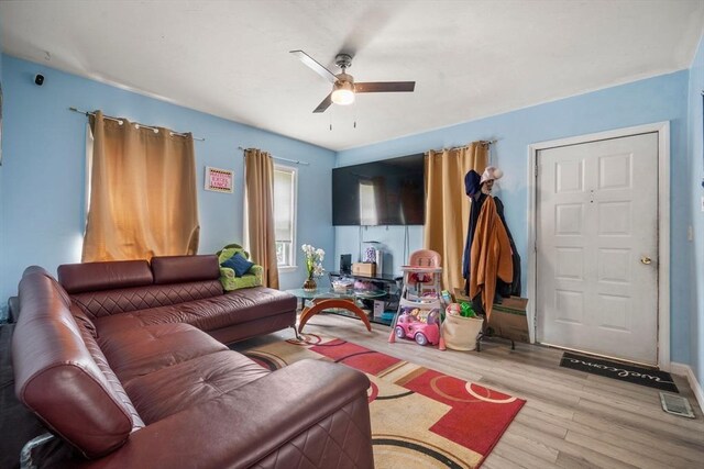 1438 Somerset Ave, Taunton, MA 02780 - living area featuring a ceiling fan and wood finished floors