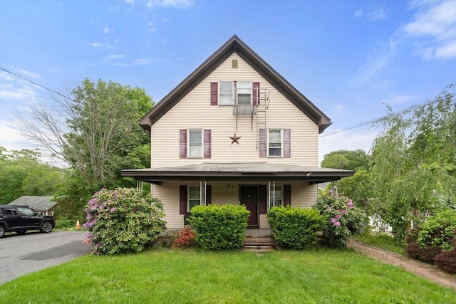 1438 Somerset Ave, Taunton, MA 02780 - view of front of home with a porch and a front lawn