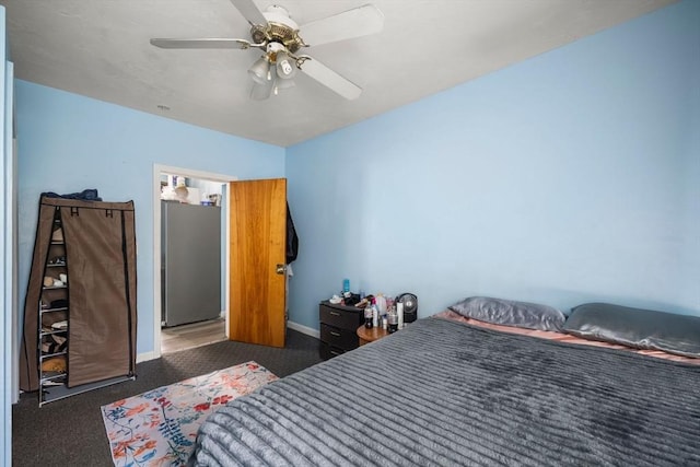 1438 Somerset Ave, Taunton, MA 02780 - bedroom with freestanding refrigerator, baseboards, carpet, and a ceiling fan
