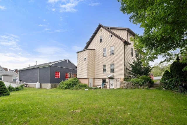 1438 Somerset Ave, Taunton, MA 02780 - back of property featuring a lawn