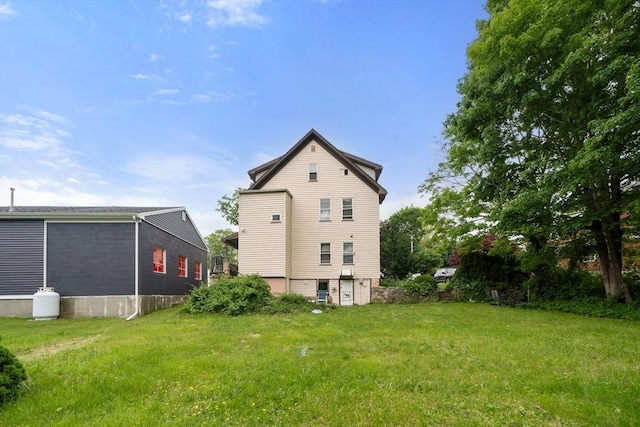 1438 Somerset Ave, Taunton, MA 02780 - rear view of property featuring a lawn