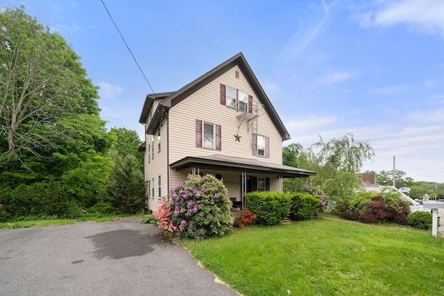 1438 Somerset Ave, Taunton, MA 02780 - view of front of property with a front lawn and covered porch
